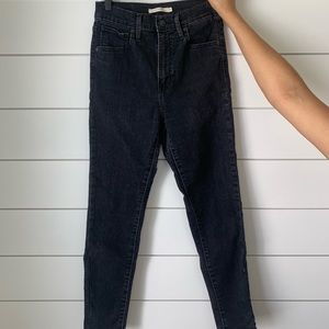 Black washed Levi’s skinny jeans